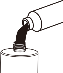 Screwing the filled oil bottle back onto the A-P353 body
