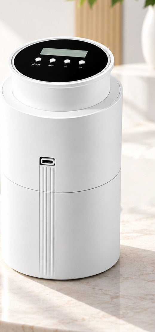 WSNUEEE TX500 waterless cold air aroma diffuser in white with its LCD control panel